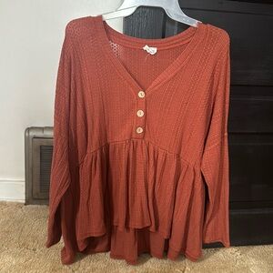 Peach Love California rust colored long sleeve buttoned peplum top